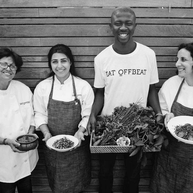 Eat Offbeat staff members holding different dishes as well as freshly picked items.