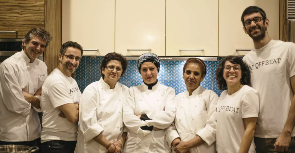 The team of Eat Offbeat Staff and Chefs combine together for a photo in the kitchen.